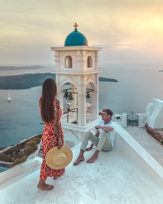 sunset on the Church in Imerovigli overlooking the Santorini Caldera