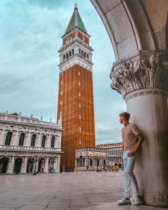 man looking on the campanile of St. Mark's in Venice