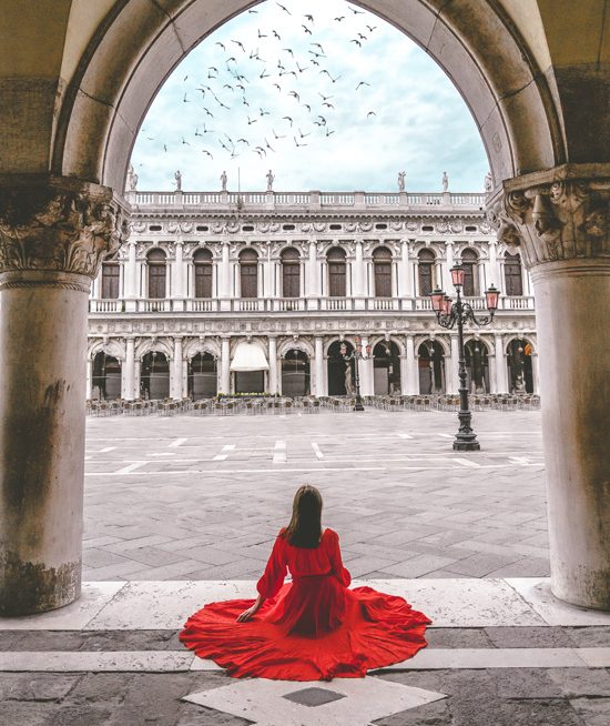 Anna sitting on the Piazza San Marco